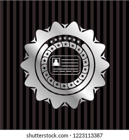 identification card icon inside silvery emblem
