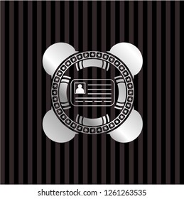 identification card icon inside silvery emblem or badge