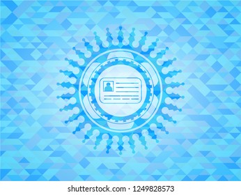 identification card icon inside sky blue emblem with triangle mosaic background