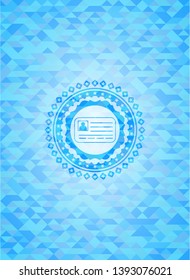 identification card icon inside sky blue mosaic emblem