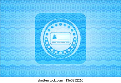 identification card icon inside water wavec oncept emblem.