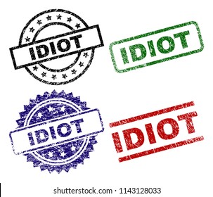 IDIOT seal prints with corroded texture. Black, green,red,blue vector rubber prints of IDIOT tag with corroded texture. Rubber seals with round, rectangle, medallion shapes.