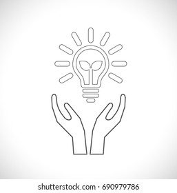 icono del diseño ecológico de la bombilla ightbulb con las manos cuidadosas