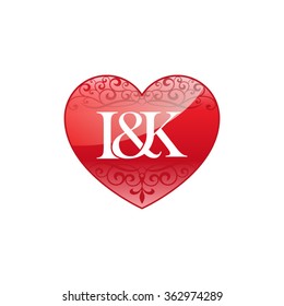 I&K initial letter couple logo with ornament heart shape