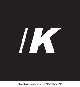 IK negative space letter logo black background