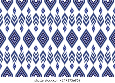 Ikat abstract. Seamless geometric pattern in tribal, folk embroidery style. Aztec geometric art ornament print.Design for carpet, wallpaper, clothing, wrapping, fabric, cover, textile.