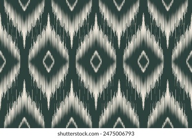 Ikat abstract. Seamless geometric pattern in tribal, folk embroidery style. Aztec geometric art ornament print.Design for carpet, wallpaper, clothing, wrapping, fabric, cover, textile.