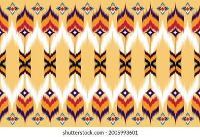 ikat abstract yellow. Seamless geometric pattern in tribal, 
folk embroidery, and Mexican style. Aztec geometric art ornament print.
Design for carpet, wallpaper, clothing, wrapping, fabric, cover, te