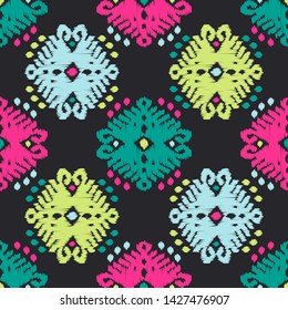Ikat. Art seamless pattern. Ethnic print. Multicolored. Boho. Traditional ornament. Folk motif. Vector geometric background. Can be used for social media, posters, email, print, ads designs.