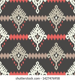 Ikat. Art seamless pattern. Ethnic print. Multicolored. Boho. Traditional ornament. Folk motif. Vector geometric background. Can be used for social media, posters, email, print, ads designs.