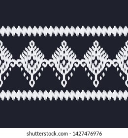 Ikat. Art seamless pattern. Ethnic print. Multicolored. Boho. Traditional ornament. Folk motif. Vector geometric background. Can be used for social media, posters, email, print, ads designs.