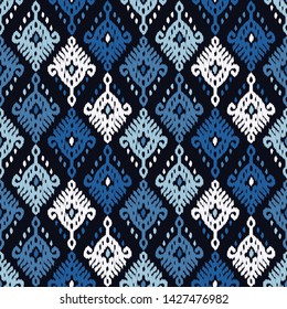 Ikat. Art seamless pattern. Ethnic print. Multicolored. Boho. Traditional ornament. Folk motif. Vector geometric background. Can be used for social media, posters, email, print, ads designs.