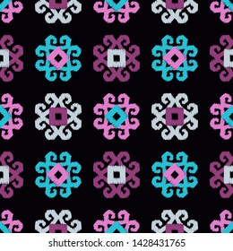 Ikat. Art seamless pattern. Ethnic print. Multicolored. Boho. Traditional ornament. Folk motif. Vector geometric background. Can be used for social media, posters, email, print, ads designs.