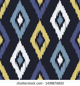 Ikat. Art seamless pattern. Ethnic print. Multicolored. Boho. Traditional ornament. Folk motif. Vector geometric background. Can be used for social media, posters, email, print, ads designs.