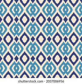 Ikat art seamless pattern. Tie-dye background. Traditional classic wallpaper. Folk style for fashion, interior, home decoration. Vector.