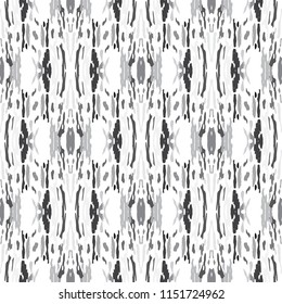 Ikat batik print in modern style, shibori fabric design. Tribal ethnic seamless pattern. Vintage endless repeat ornament. Traditional folk ikat texture. Vector watercolor geometric background.