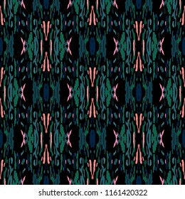 Ikat batik print in modern style, shibori fabric design. Tribal ethnic seamless pattern. Vintage endless repeat ornament. Traditional folk ikat texture. Vector watercolor geometric background.