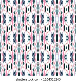 Ikat batik print in modern style, shibori fabric design. Tribal ethnic seamless pattern. Vintage endless repeat ornament. Traditional folk ikat texture. Vector watercolor geometric background.