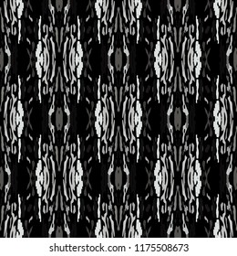 Ikat batik print in modern style, shibori fabric design. Tribal ethnic seamless pattern. Vintage endless repeat ornament. Traditional folk ikat texture. Vector watercolor geometric background.