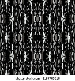 Ikat batik print in modern style, shibori fabric design. Tribal ethnic seamless pattern. Vintage endless repeat ornament. Traditional folk ikat texture. Vector watercolor geometric background.