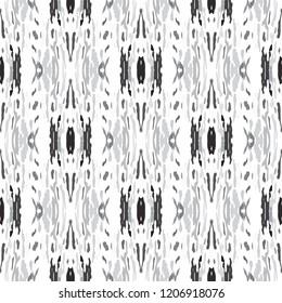 Ikat batik print in modern style, shibori fabric design. Tribal ethnic seamless pattern. Vintage endless repeat ornament. Traditional folk ikat texture. Vector watercolor geometric background.