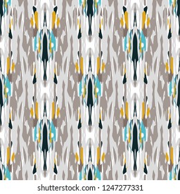 Ikat batik print modern style, shibori fabric design. Tribal embroidery ethnic seamless pattern. Vintage endless repeat ornament. Traditional folk ikat texture. Vector watercolor geometric background.