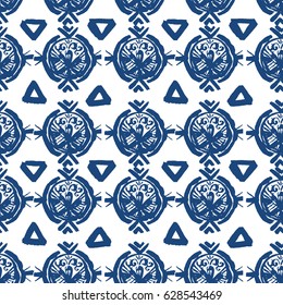 Ikat blue indigo shibori seamless pattern in vector. Modern batik print.