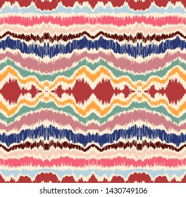 Ikat border. Geometric folk ornament. Ink on clothes. Tribal vector texture. Seamless striped pattern in Aztec style. Ethnic embroidery. Indian, Scandinavian, Gypsy, Mexican, African rug.