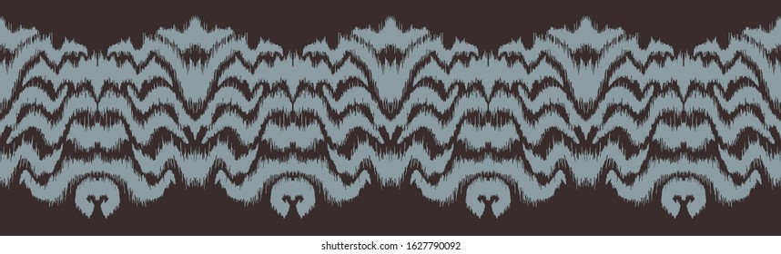 Ikat border. Geometric folk ornament. Tribal vector texture. Seamless striped pattern in Aztec style. Ethnic embroidery. Indian, Scandinavian, Gypsy, Mexican, African rug.