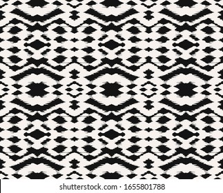 Ikat border. Geometric folk ornament. Tribal vector texture. Seamless striped pattern in Aztec style. Ethnic embroidery. Indian, Scandinavian, Gypsy, Mexican, African rug.