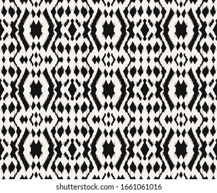 Ikat border. Geometric folk ornament. Tribal vector texture. Seamless striped pattern in Aztec style. Ethnic embroidery. Indian, Scandinavian, Gypsy, Mexican, African rug.