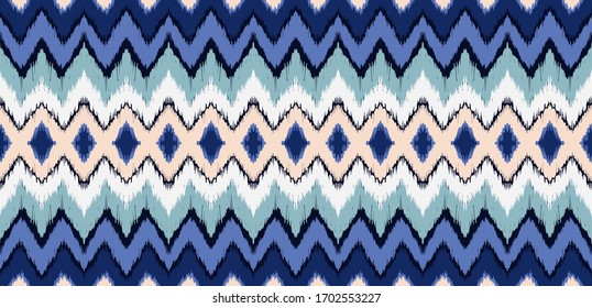 Ikat border. Geometric folk ornament. Tribal vector texture. Seamless striped pattern in Aztec style. Ethnic embroidery. Indian, Scandinavian, Gypsy, Mexican, African rug.