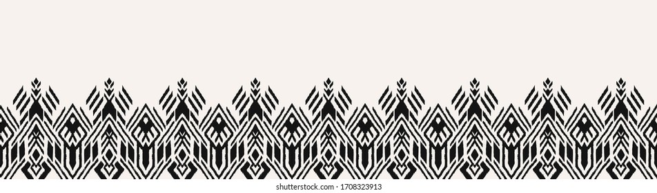 Ikat border. Geometric folk ornament. Tribal vector texture. Seamless striped pattern in Aztec style. Ethnic embroidery. Indian, Scandinavian, Gypsy, Mexican, African rug.