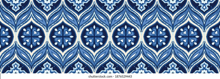 Ikat border. Geometric folk ornament. Ink on clothes. Tribal vector texture. Seamless striped pattern in Aztec style. Ethnic embroidery. Indian, Scandinavian, Gypsy, Mexican, African rug.