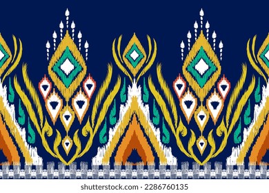 Ikat chevron paisley embroidery background.Ikat ethnic oriental pattern traditional.Aztec style abstract vector illustration.Vector seamless pattern with ink hand 
design for texture,fabric,clothing.