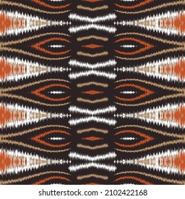 Ikat chevron. ikat woven texture folklore ornament with diamonds. Tribal ethnic vector texture. Seamless striped pattern in Aztec style. Folk embroidery. Indian, Scandinavian, Gypsy, Mexican, African