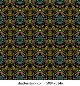 Ikat damask seamless pattern background tile on black background in green colors.
