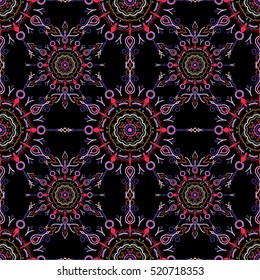 Ikat damask seamless pattern background tile on black background in yellow, pink and violet colors.