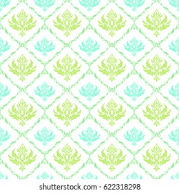 Ikat damask seamless pattern background tile in a blue and green colors.