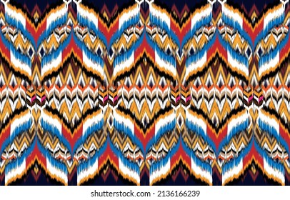 Ikat ethnic abstract beautiful art. Ikat seamless pattern in tribal, 
folk embroidery, Mexican style. Aztec geometric art ornament print. 
Design for carpet, wallpaper, clothing