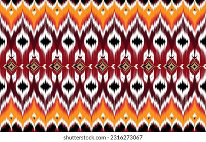 Ikat ethnic abstract beautiful art. Ikat seamless pattern in tribal, 
folk embroidery, Mexican style. Aztec geometric art ornament print. 
Design for carpet, wallpaper, clothing, wrapping, fabric,cove