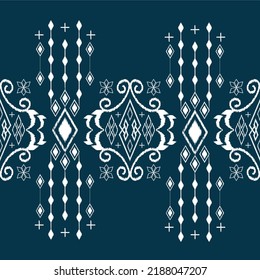 Vector de fondo étnico Ikat. Lujoso patrón de diamante sin mar de formas geométricas blancas decoradas con borlos. 