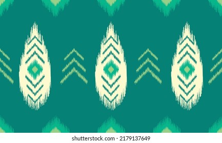 Ikat ethnic background vector. Seamless pattern in tribal, Mexican, Indian. Green leaves and nature concept.