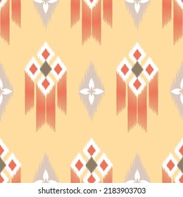 Ikat ethnic background vector. Seamless geometric pattern in white,orange, purple.  Design for fabric,clothing,home decor,wallpaper,wrapping,ornament.