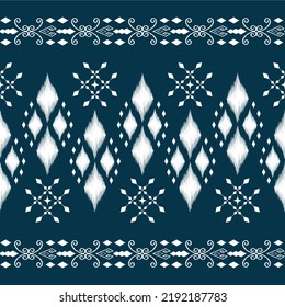 Vector de fondo étnico Ikat. Patrón inexorable de formas geométricas abstractas blancas en el hermoso concepto floral.