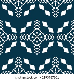 Ikat ethnic background vector. Seamless pattern of white geometric shapes in abstract concept.