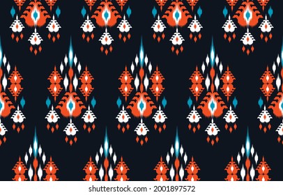 Ikat ethnic design abstract background. Seamless pattern in tribal,folk embroidery,chevron art design. Aztec geometric art ornament print.Design for carpet, wallpaper, clothing,wrapping,fabric,cover