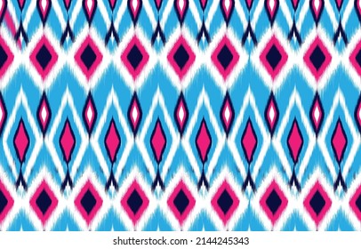 Ikat ethnic design abstract background. Seamless pattern in tribal,
folk embroidery,chevron art design. Aztec geometric art ornament print.
Design for carpet, wallpaper, clothing,wrapping,fabric,cover