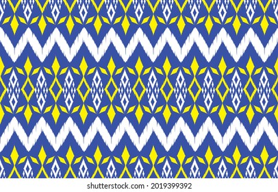 Ikat ethnic design background. Seamless ikat zigzag chevron pattern in tribal, folk embroidery blue art. Aztec geometric art ornament print.Design for carpet,wallpaper, clothing,wrapping,fabric,cover