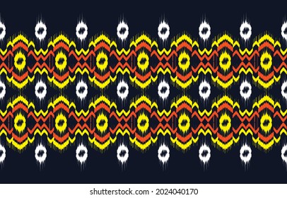 Ikat ethnic design colorful background. Seamless pattern in tribal, folk embroidery abstract zigzag art. Aztec geometric art ornament print. Design for carpet, wallpaper, clothing, wrapping, fabric.